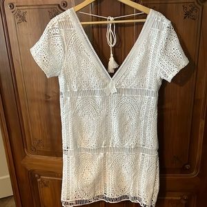 Adorable White lace dress. Worn once. Lined so no see thru.